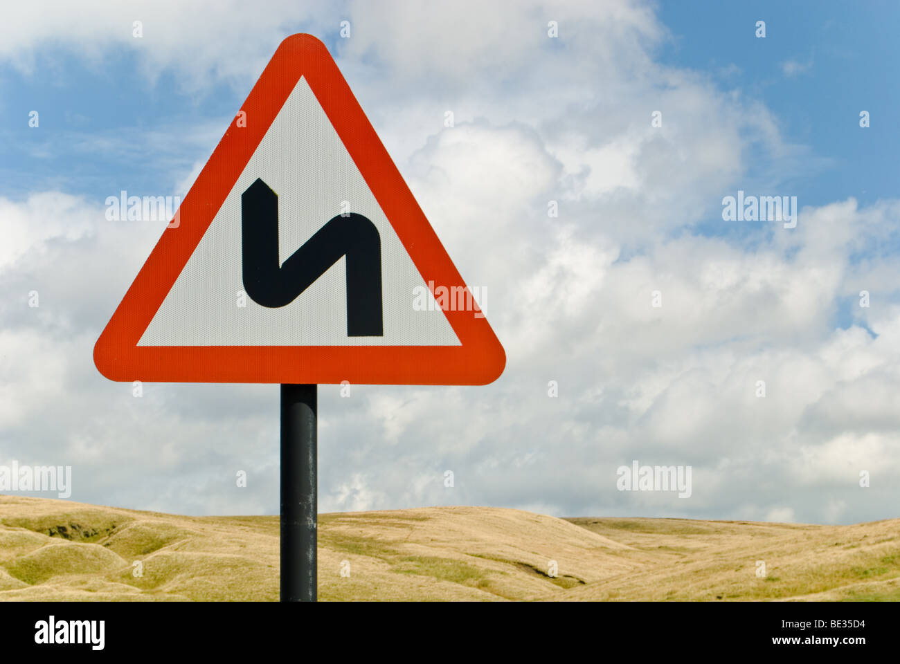 Road sign warning bend ahead hires stock photography and images Alamy