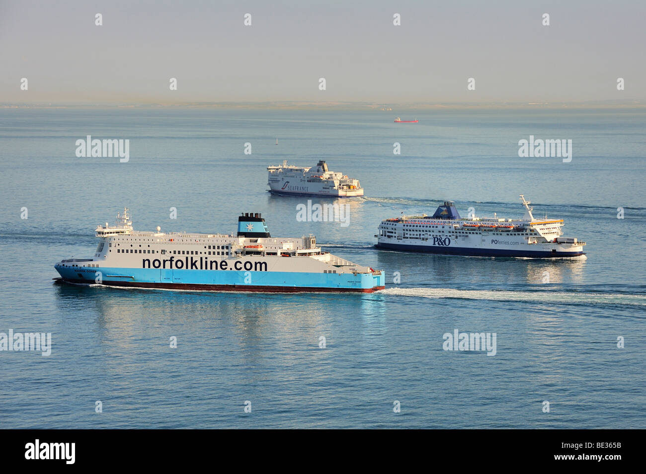 Ferries beating about the Channel in front of the ferry port of Dover, Kent, England, UK, Europe Stock Photo