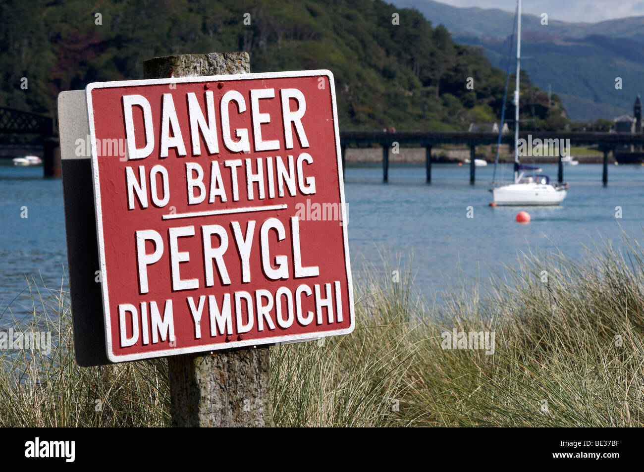 Warning sign for swimmers, Mawddach estuary, Barmouth, Hwynedd, North Wales Stock Photo
