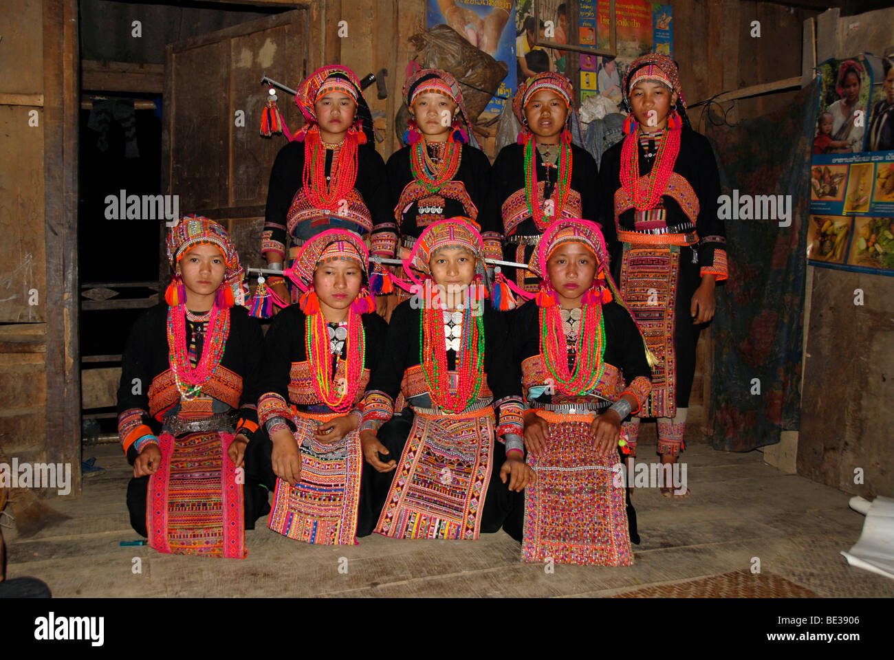 Group shot, ethnology, young Akha Pala women dressed in colourful traditional costumes, Ban Hongleuk, Muang Khoua district, Pho Stock Photo