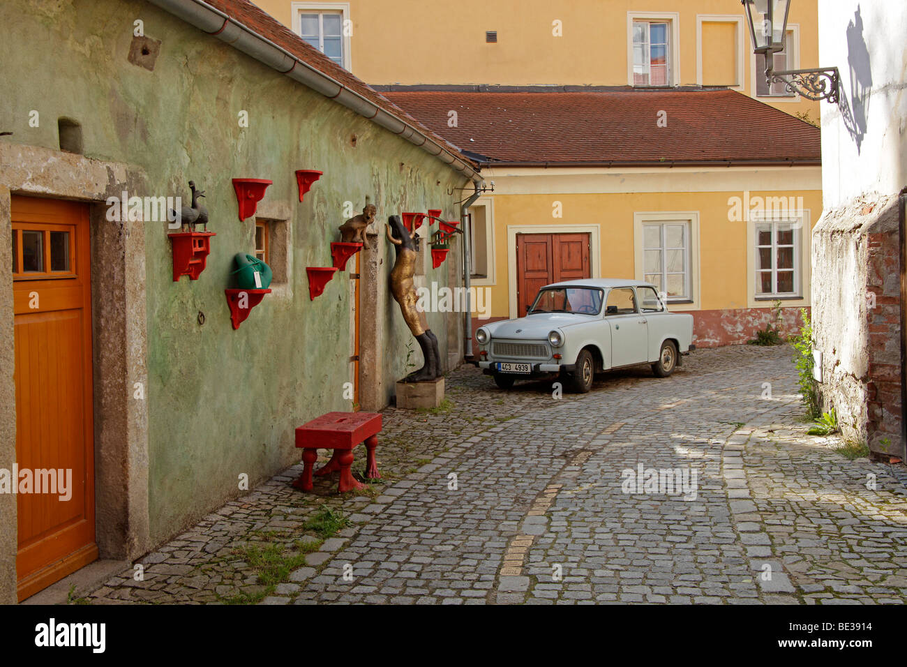 Typical GDR-car Trabant parking in an alleyway in the historic centre of Český Krumlov, Czech Republic, Europe Stock Photo