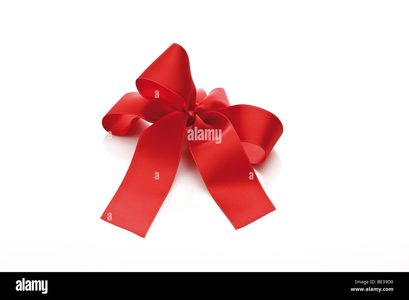 Red gift ribbon in a bow Stock Photo