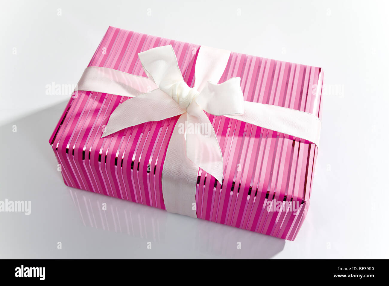 Gift box with a white ribbon Stock Photo