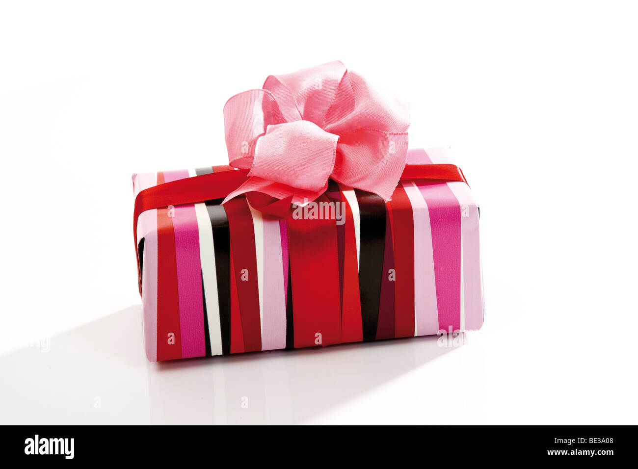 Gift box with pink ribbon Stock Photo