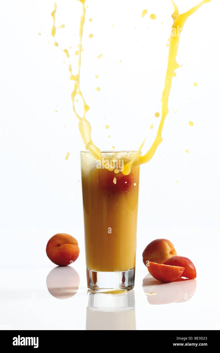 Apricot smoothie, splash Stock Photo Alamy