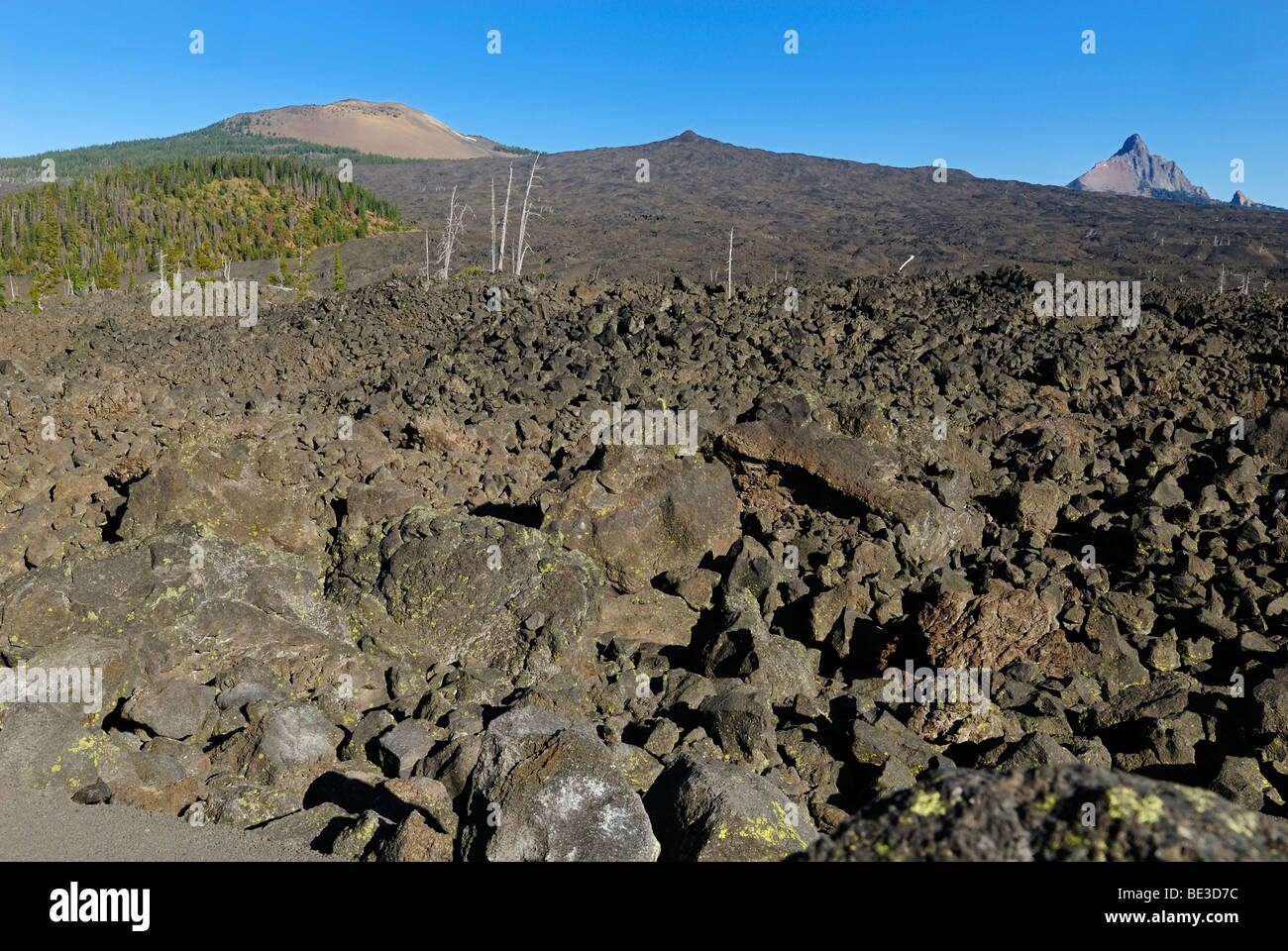 Lava landscape with Mount Washington volcano and Belknap Crater, McKenzie Pass, Cascade Range, Oregon, USA Stock Photo