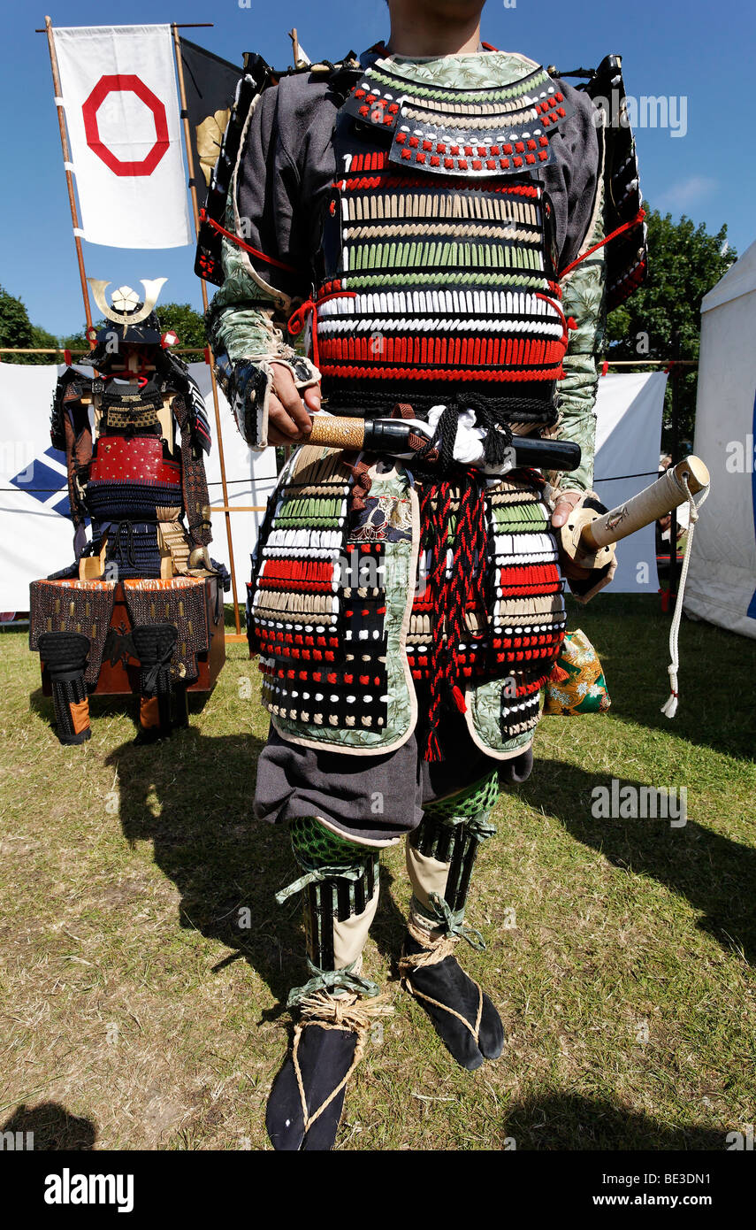 Man in a historical Japanese officer's armour, reproduction after patterns from the 16th Century, Samurai Takeda Group, Japanta Stock Photo