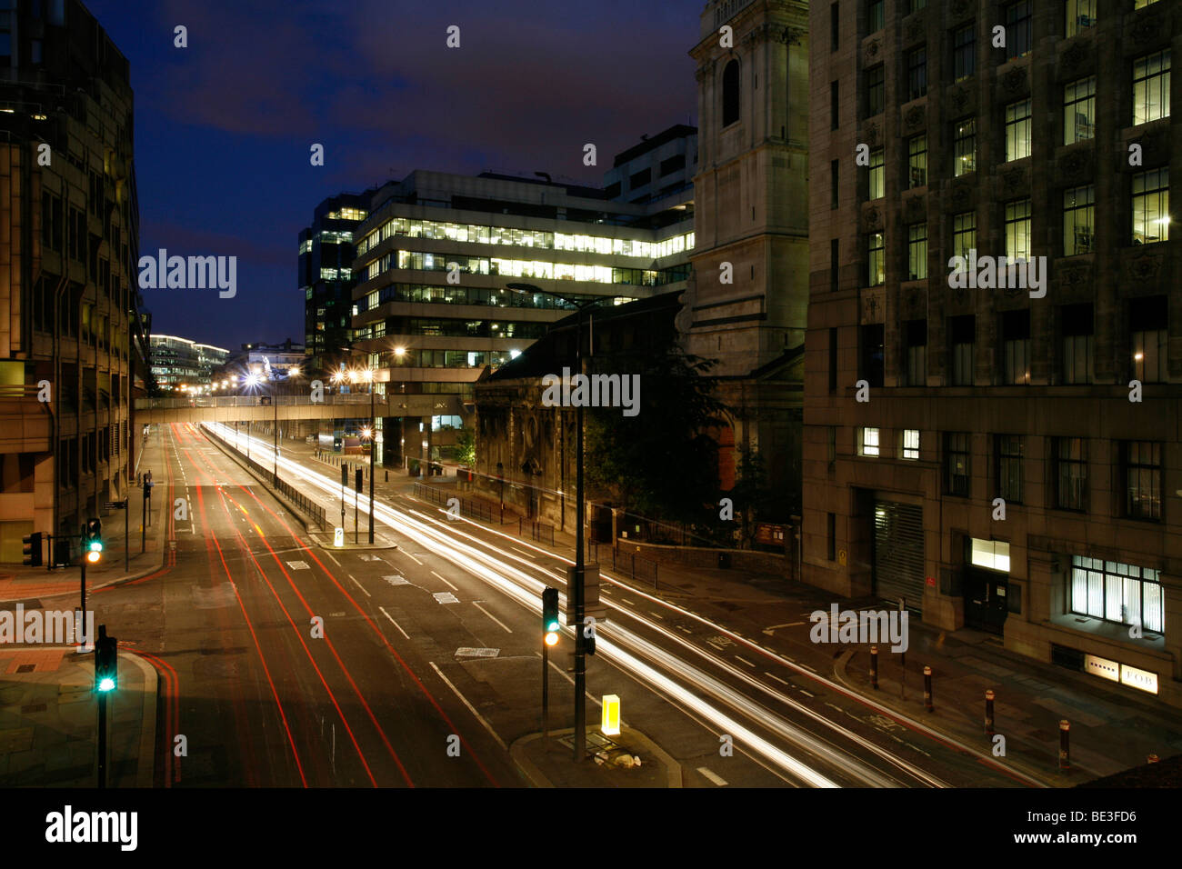 Traffic in the city centre at the blue hour, Monument, City of London, England, United Kingdom, Europe Stock Photo