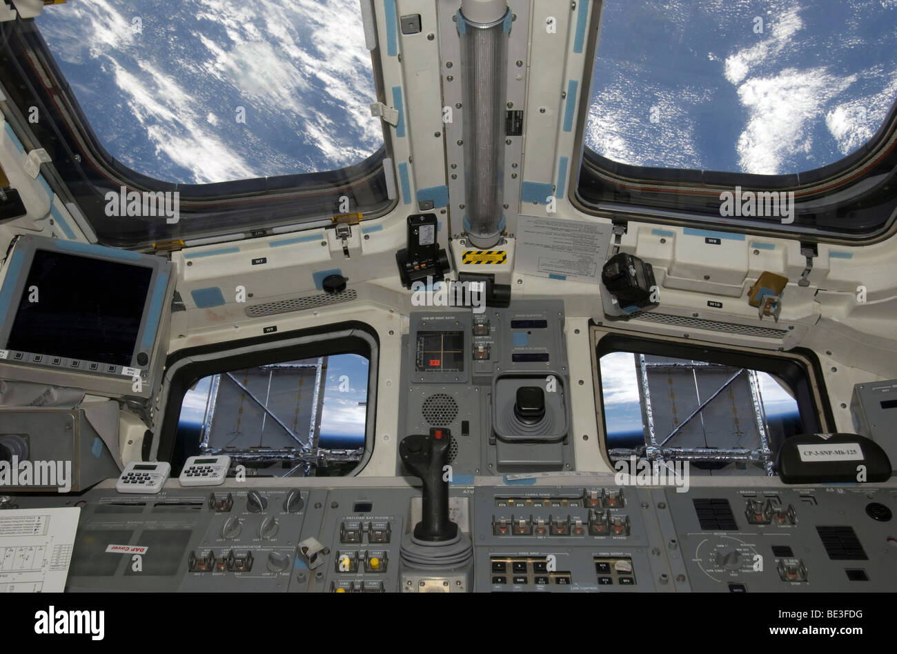 A view from inside the flight deck of Space Shuttle Atlantis. Stock Photo