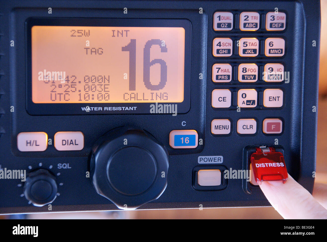 Making An Emergency Distress Call On VHF DSC Marine Radio Stock Photo ...