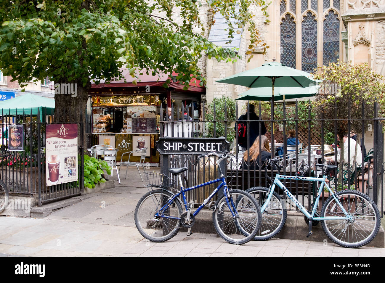 Bicycles or bikes against a railingUniversity city of Oxford UK Ship Street Stock Photo