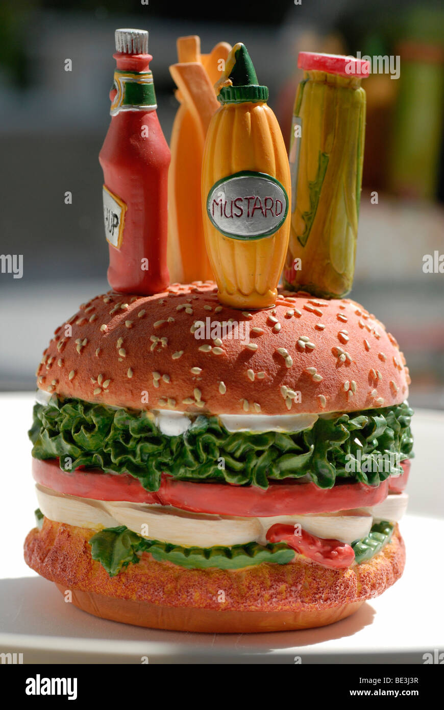 Hamburger, cheeseburger from plastic, sauce top, fast food Stock Photo