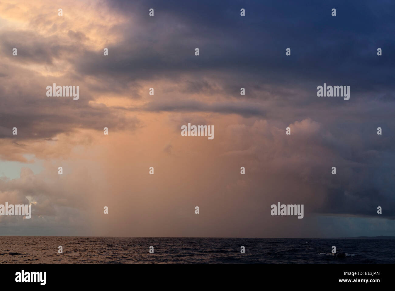 Storm, rain shower and thunderstorm over the sea Stock Photo