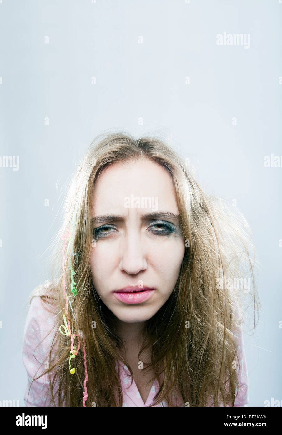 Young woman with a hangover Stock Photo