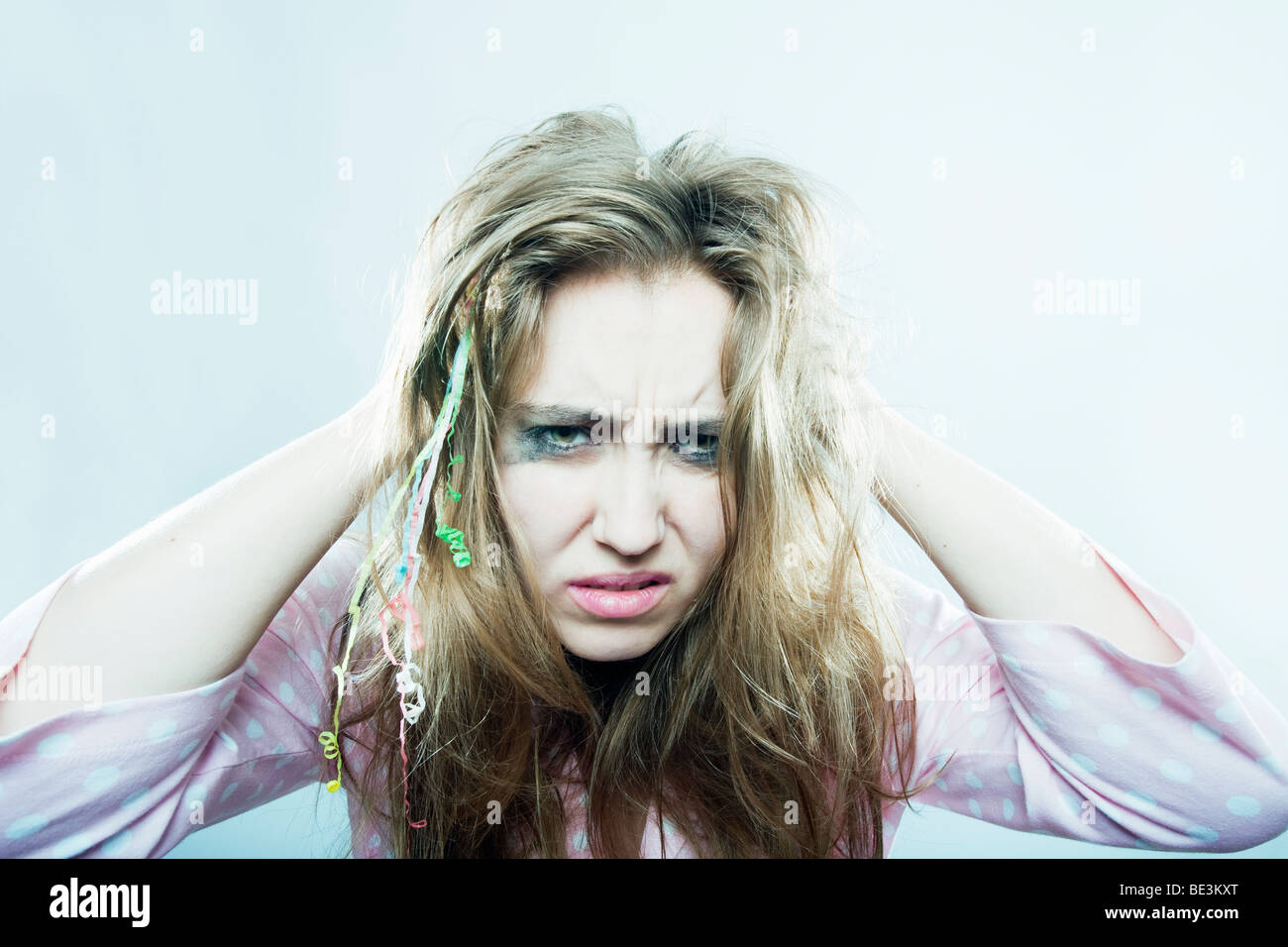 Young woman with a hangover Stock Photo