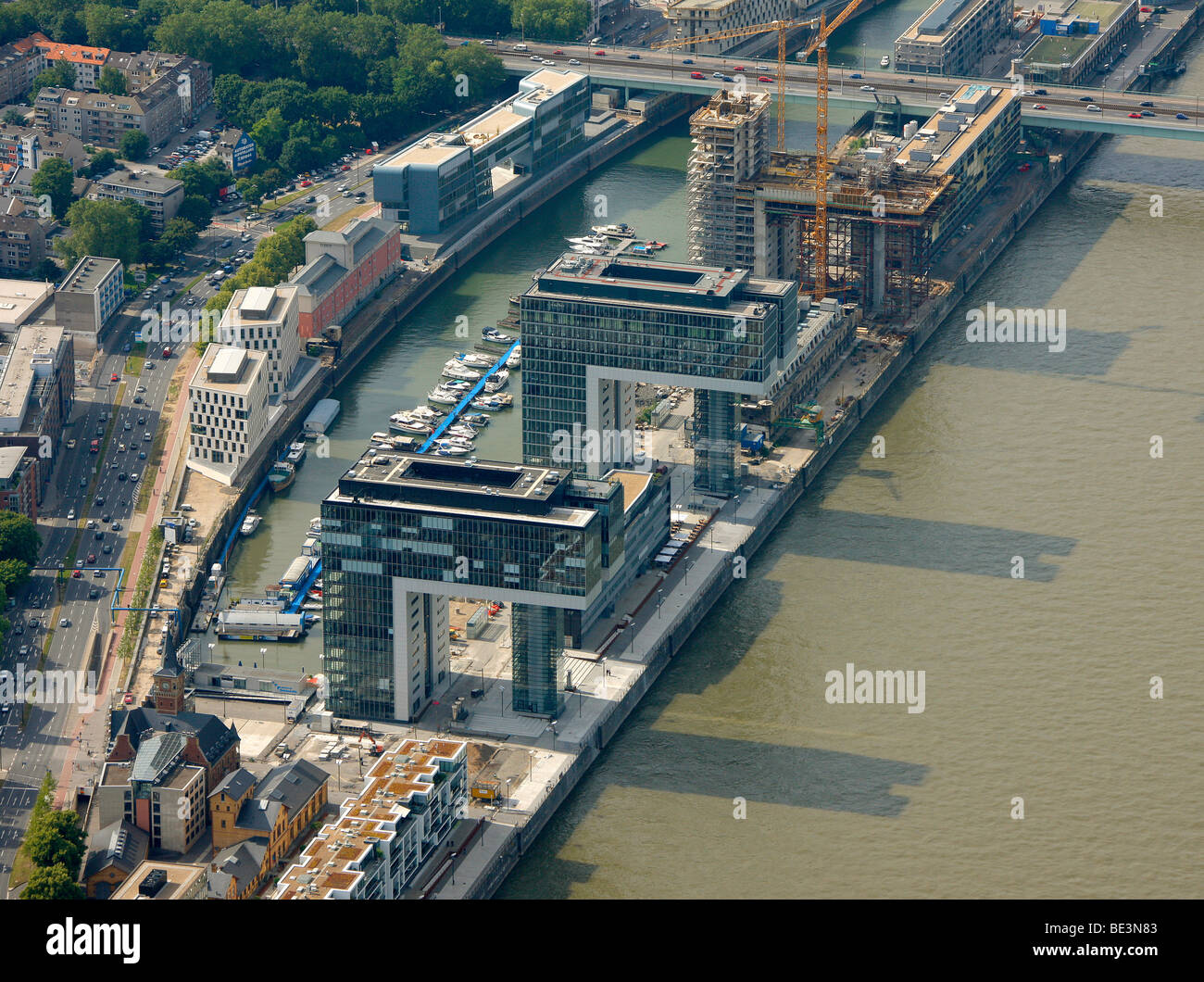 Aerial photograph, Kranhaus crane house construction site in Cologne Rheinauhafen, Pandion AG, Hafenquartier port district, Neu Stock Photo