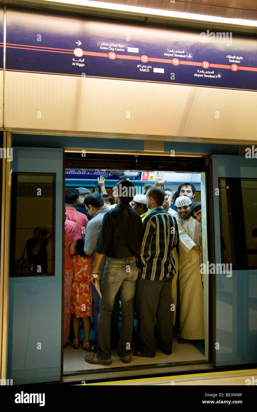 Passengers dubai metro train railway line commuter Stock Photo
