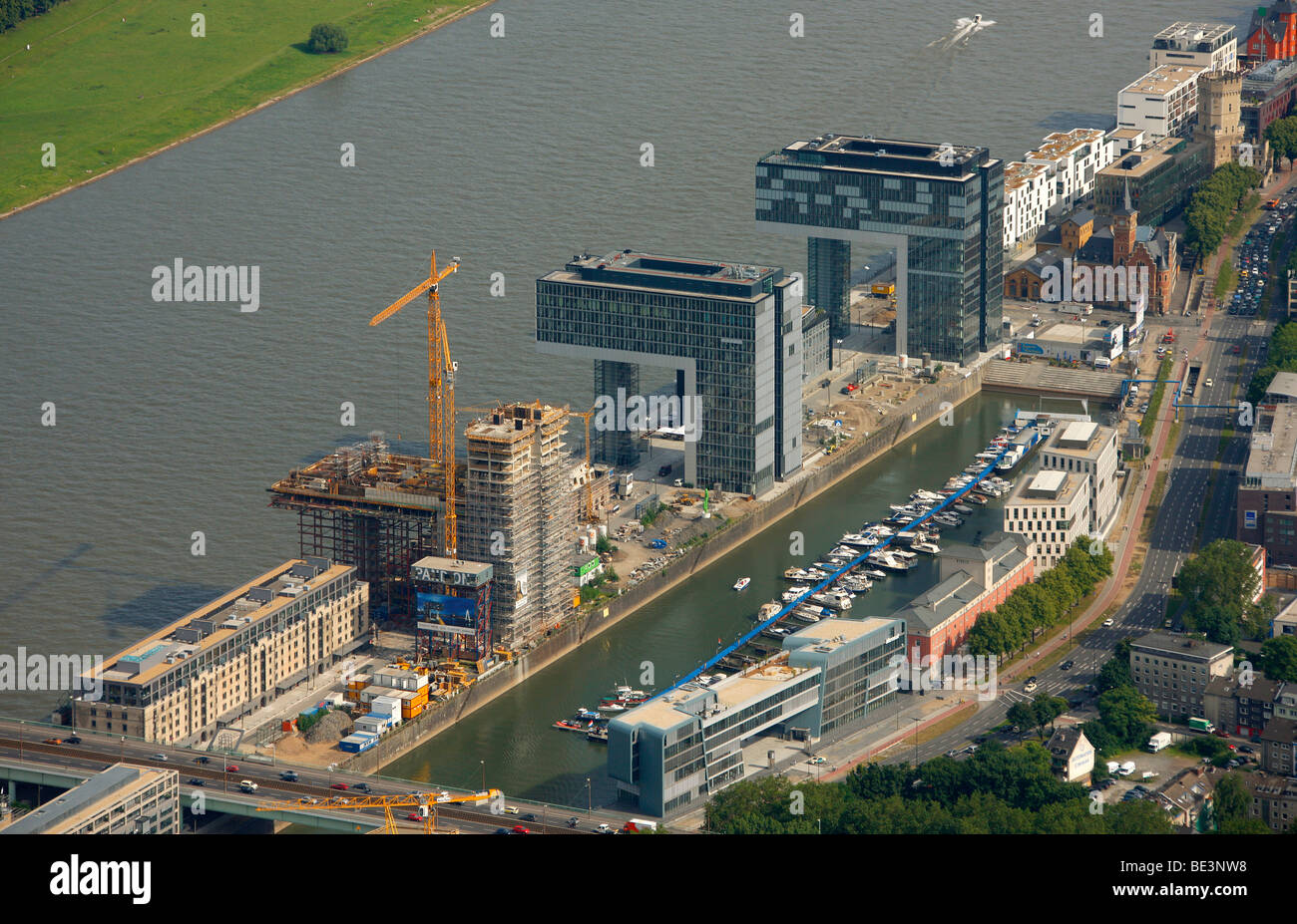 Aerial photograph, Kranhaus crane house construction site in Cologne Rheinauhafen, Pandion AG, Hafenquartier port district, Neu Stock Photo