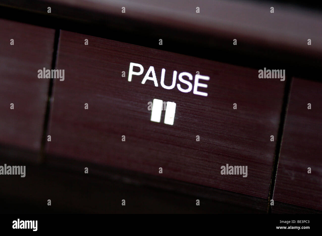 Pause button on stereo close up Stock Photo