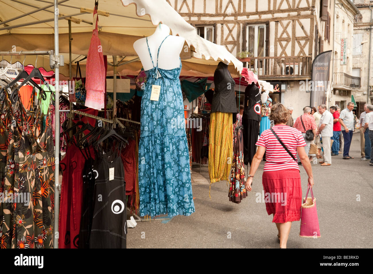 People  in the market in the town of Nerac, Aquitaine France Stock Photo
