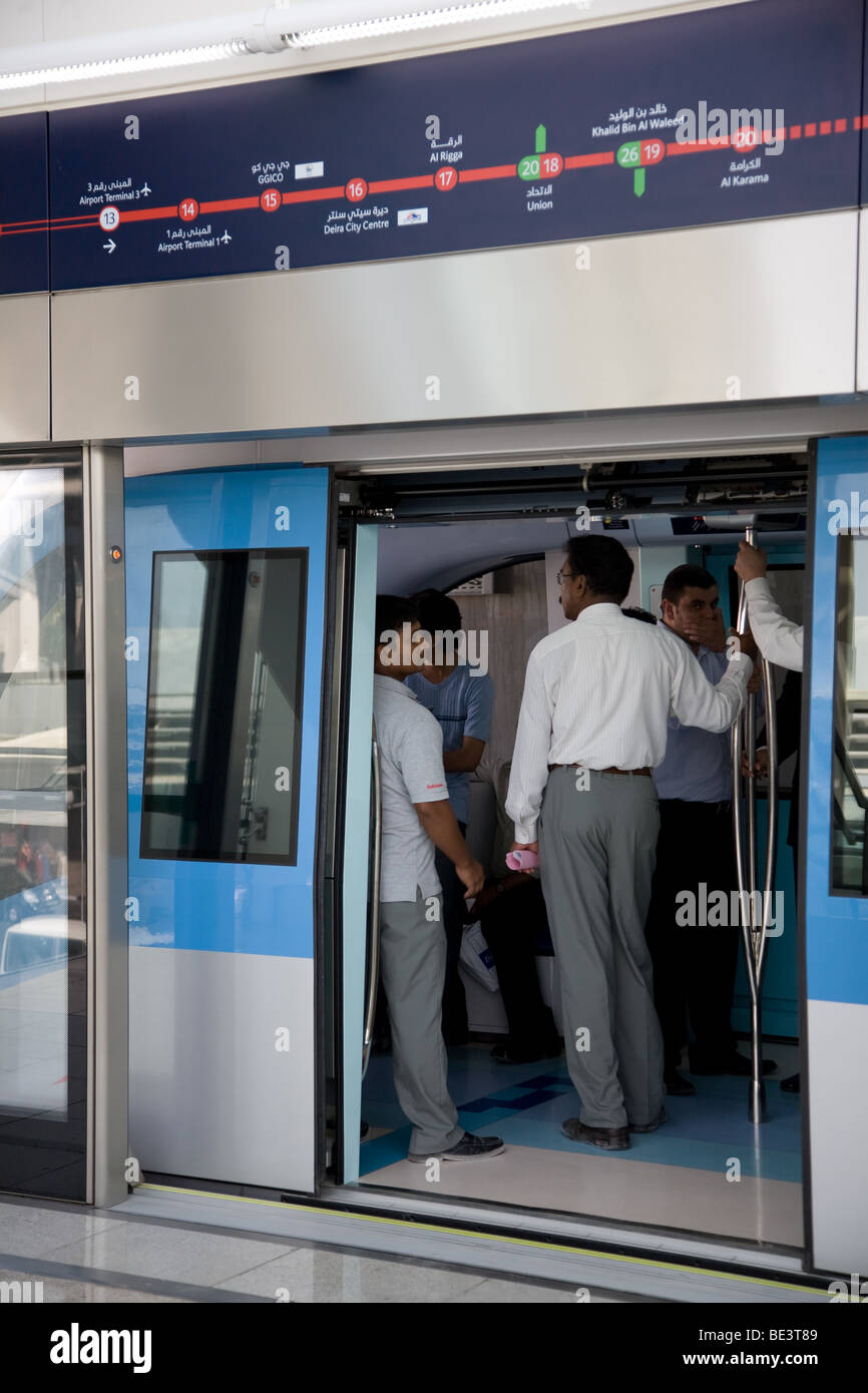 Passengers dubai metro train railway line commuter Stock Photo Alamy
