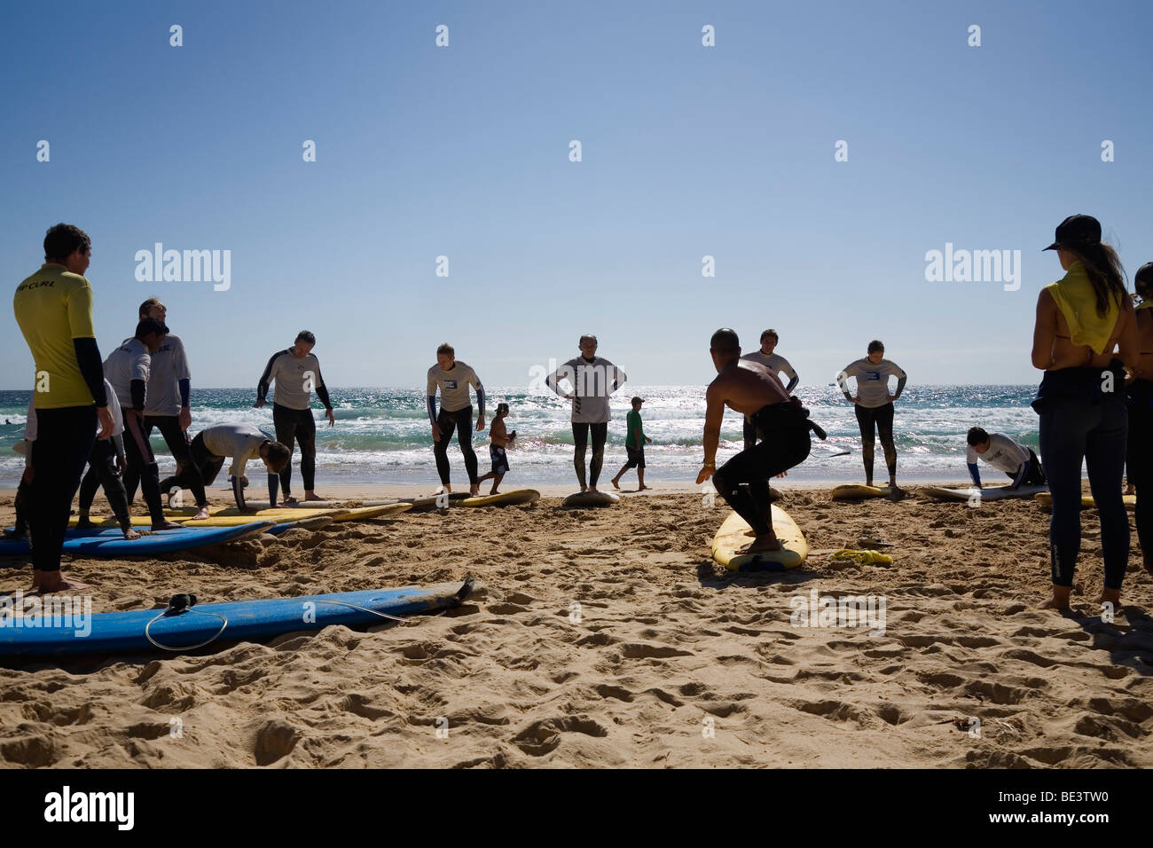 Learning to surf at Surfschool on the sands of Manly Beach. Sydney, New South Wales, AUSTRALIA Stock Photo