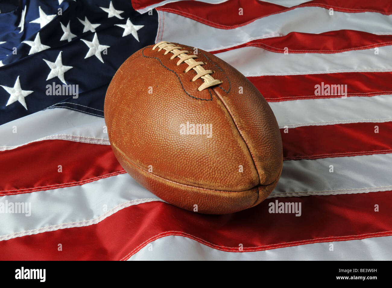 Football against a USA flag on a horizontal format Stock Photo