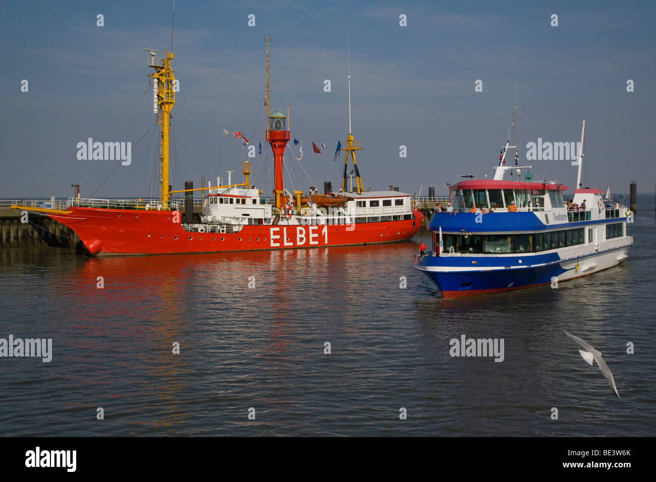 Germany, Niedersachsen, Cuxhaven, Feuerschiff Elbe 1, Bürgermeister O'Swald II and Elbe ferry Nordstern at Cuxhaven harbour. Stock Photo