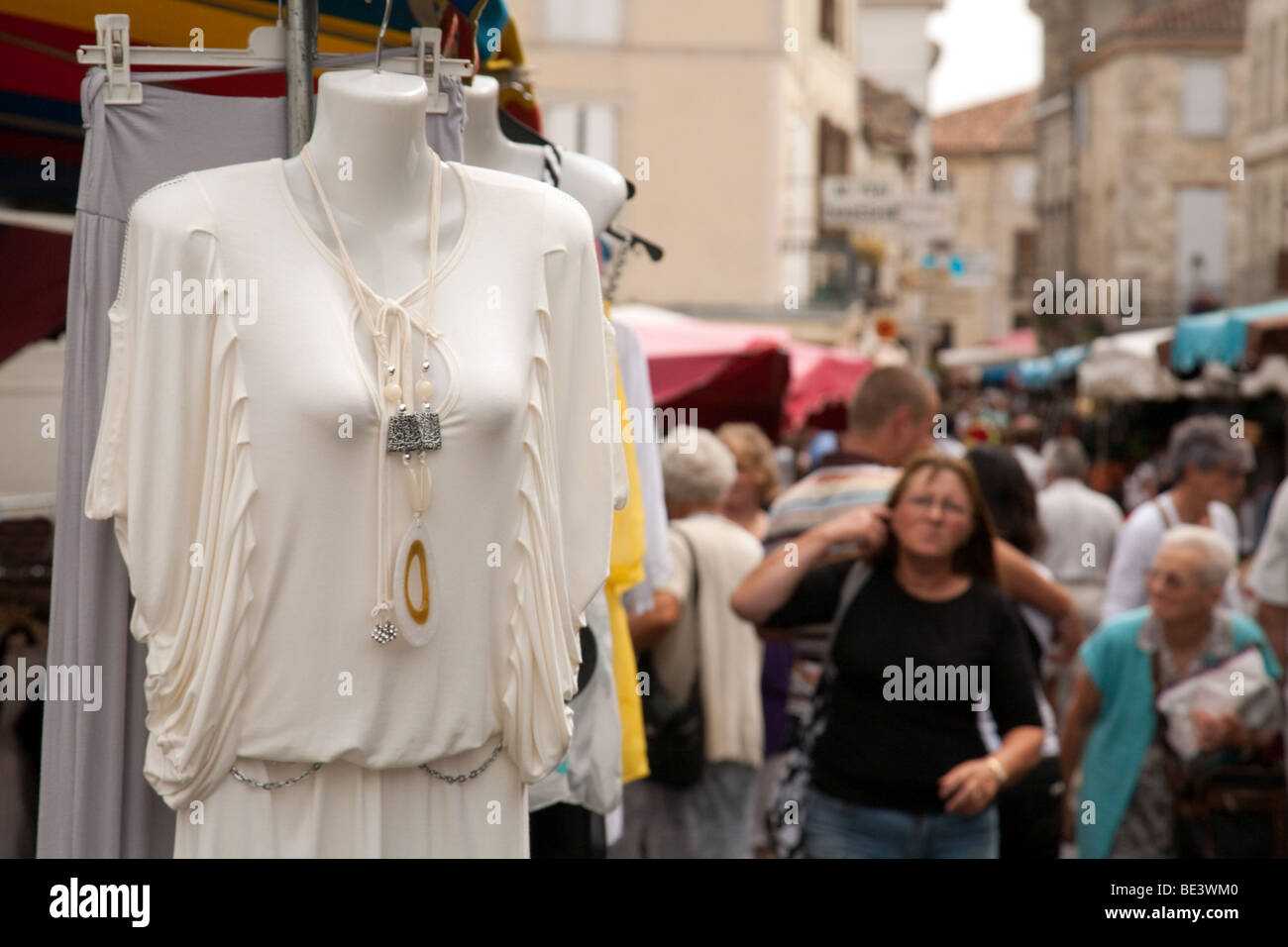 People shopping in the market in the town of Nerac, Aquitaine, France Stock Photo