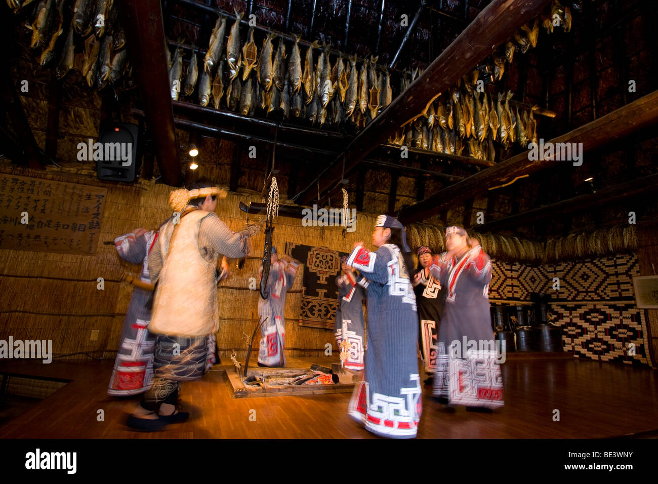 A group of Ainu perform a traditional dance to send the spirit of the ...