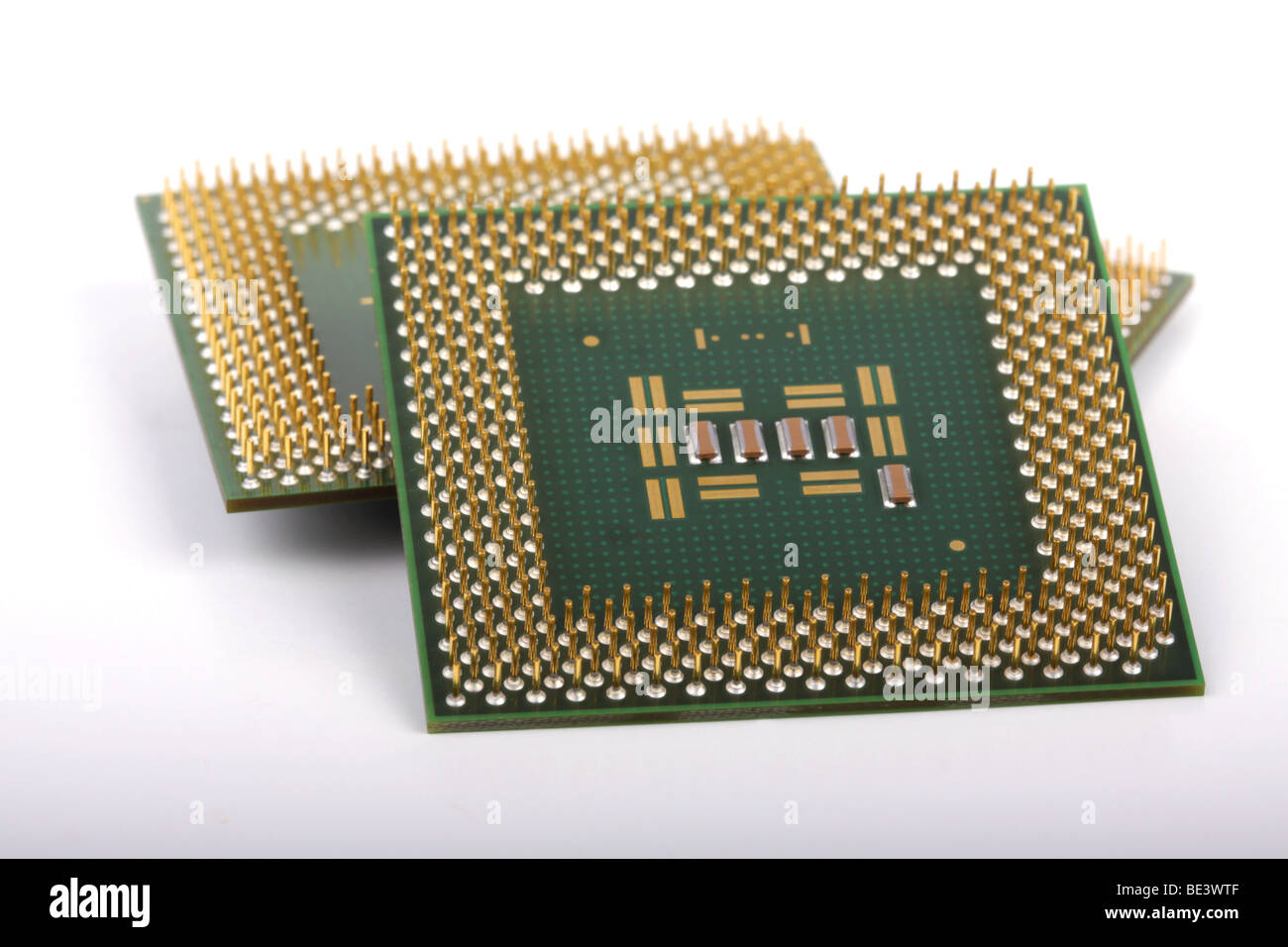 Several computer chips on a white background. Stock Photo