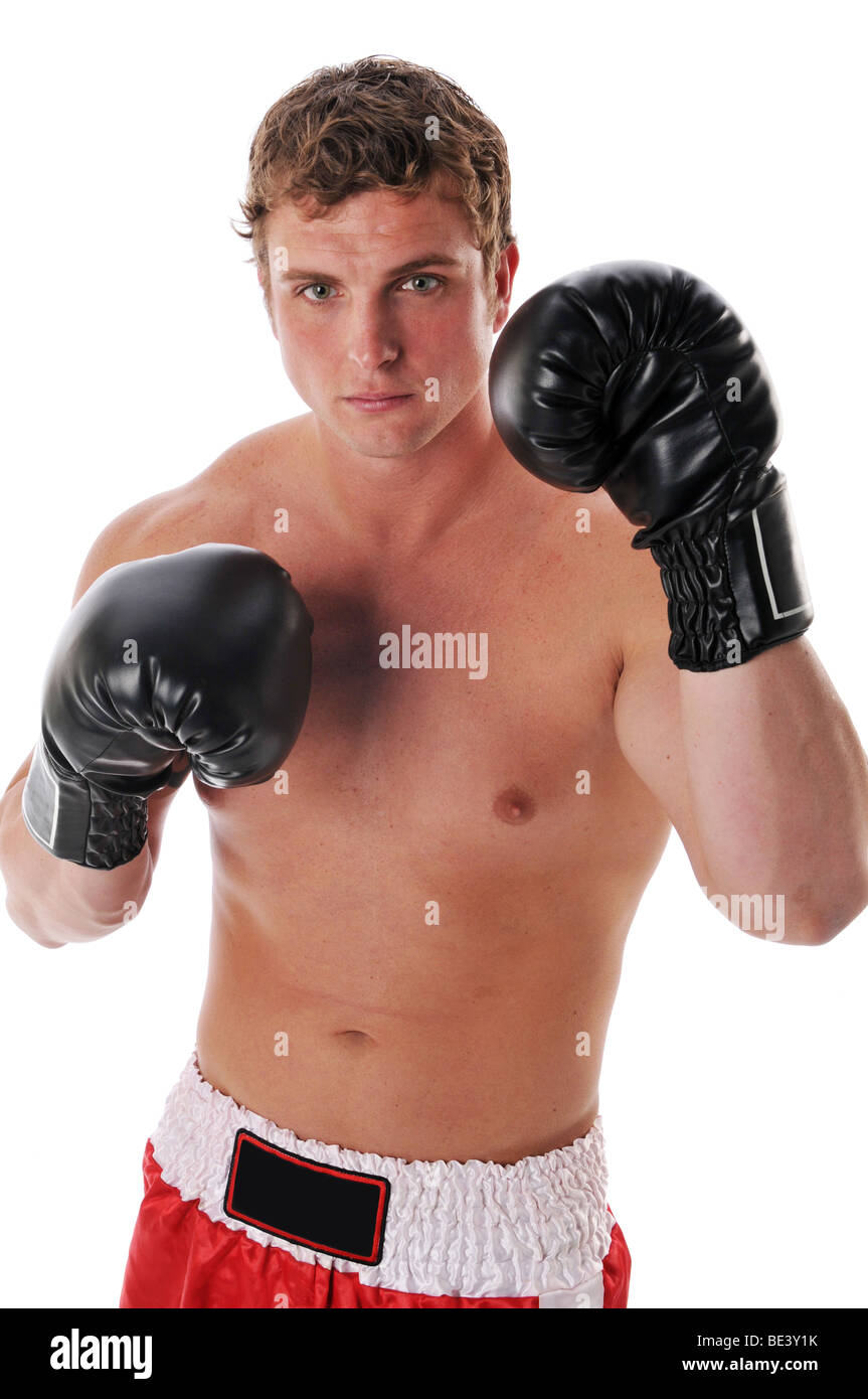 Young boxer wearing gloves isolated on a white background Stock Photo