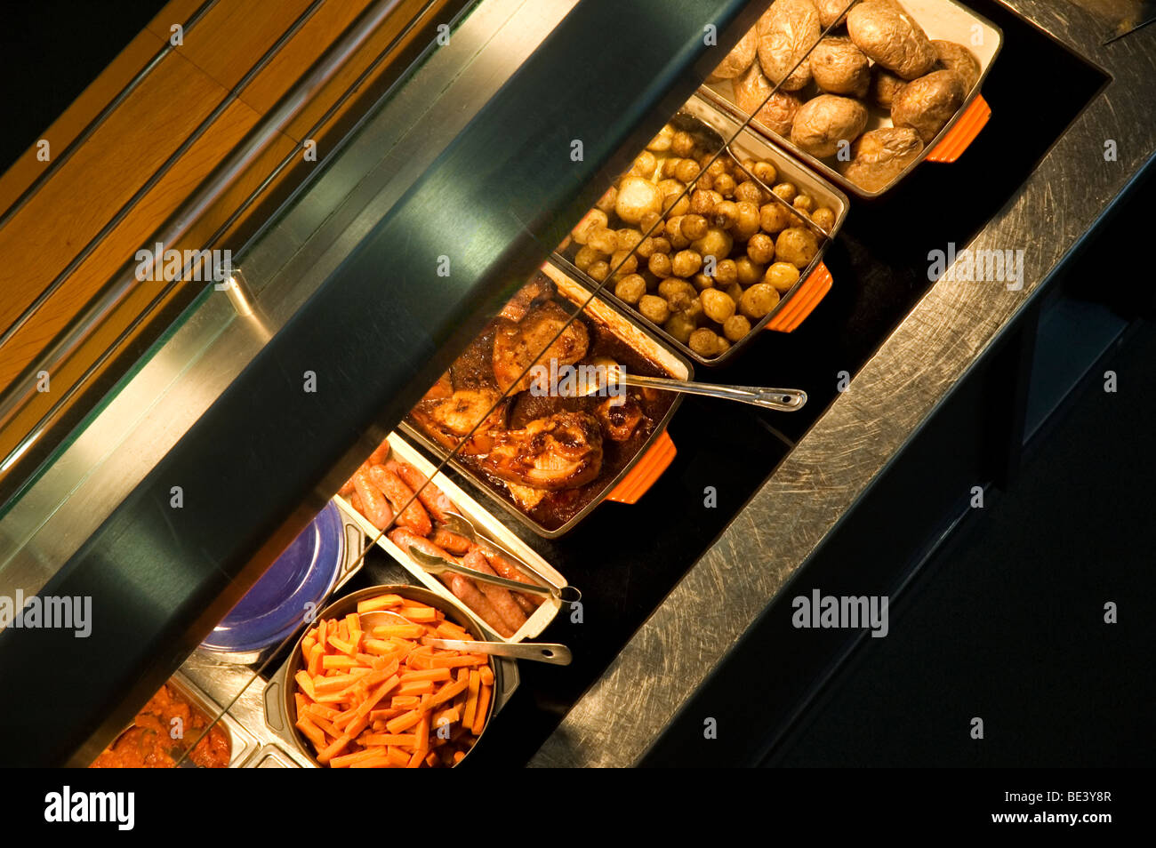 Food in a cafeteria hot counter Stock Photo