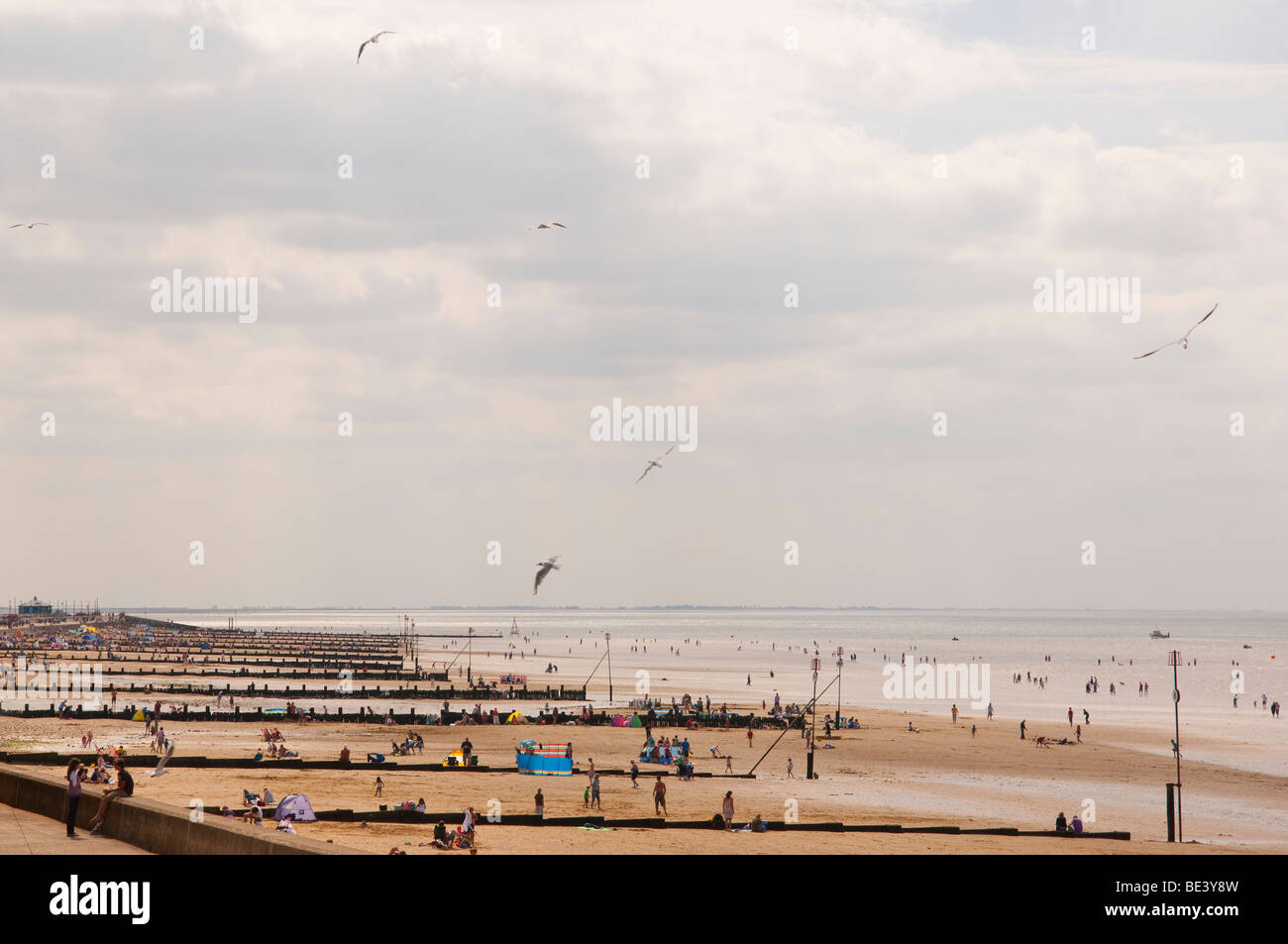 The busy beach of Hunstanton , North Norfolk , Uk packed with holidaymakers in the summer Stock Photo