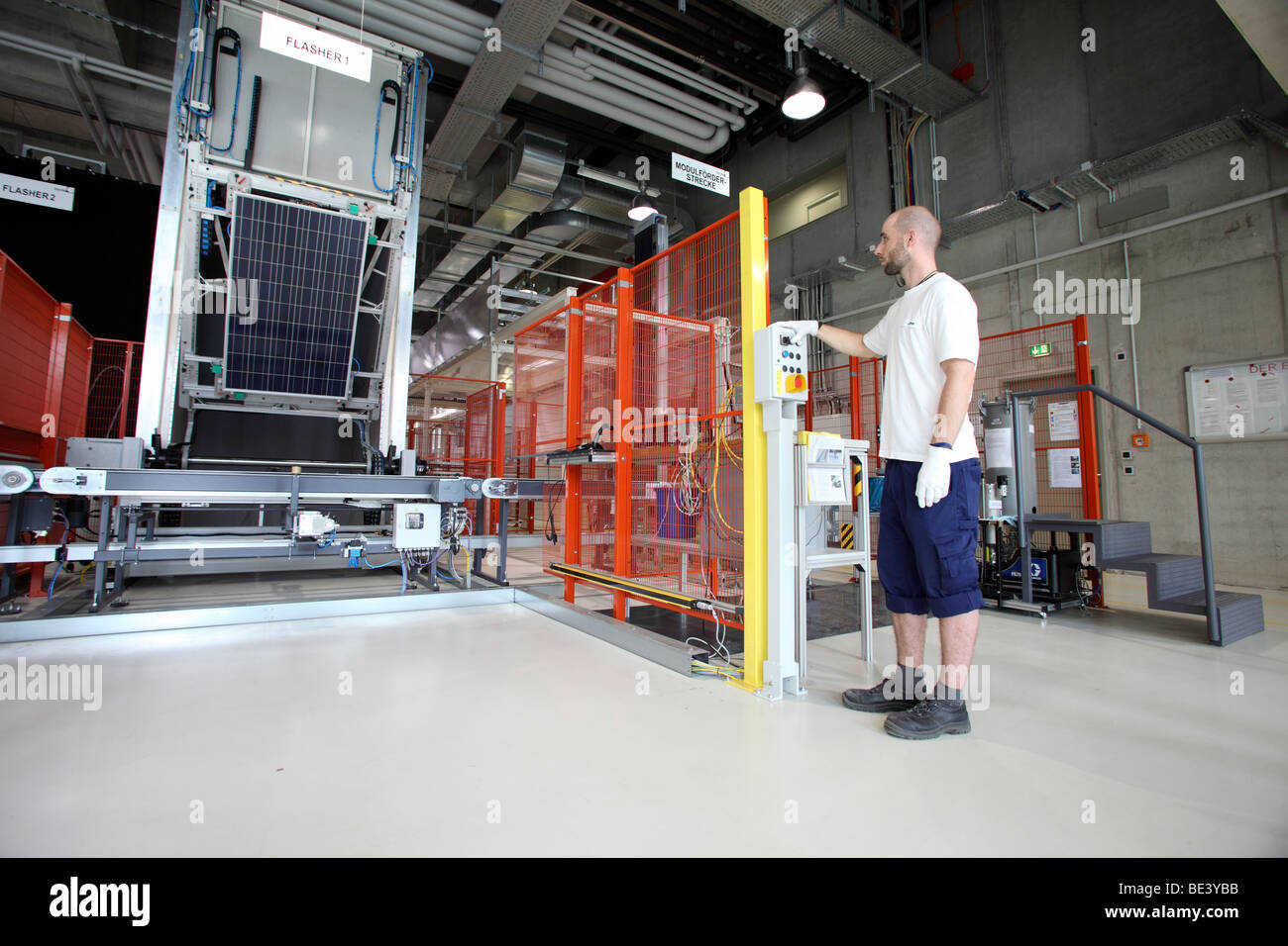 Solon SE: production of solar panels. Worker during the final quality control, BERLIN, GERMANY Stock Photo