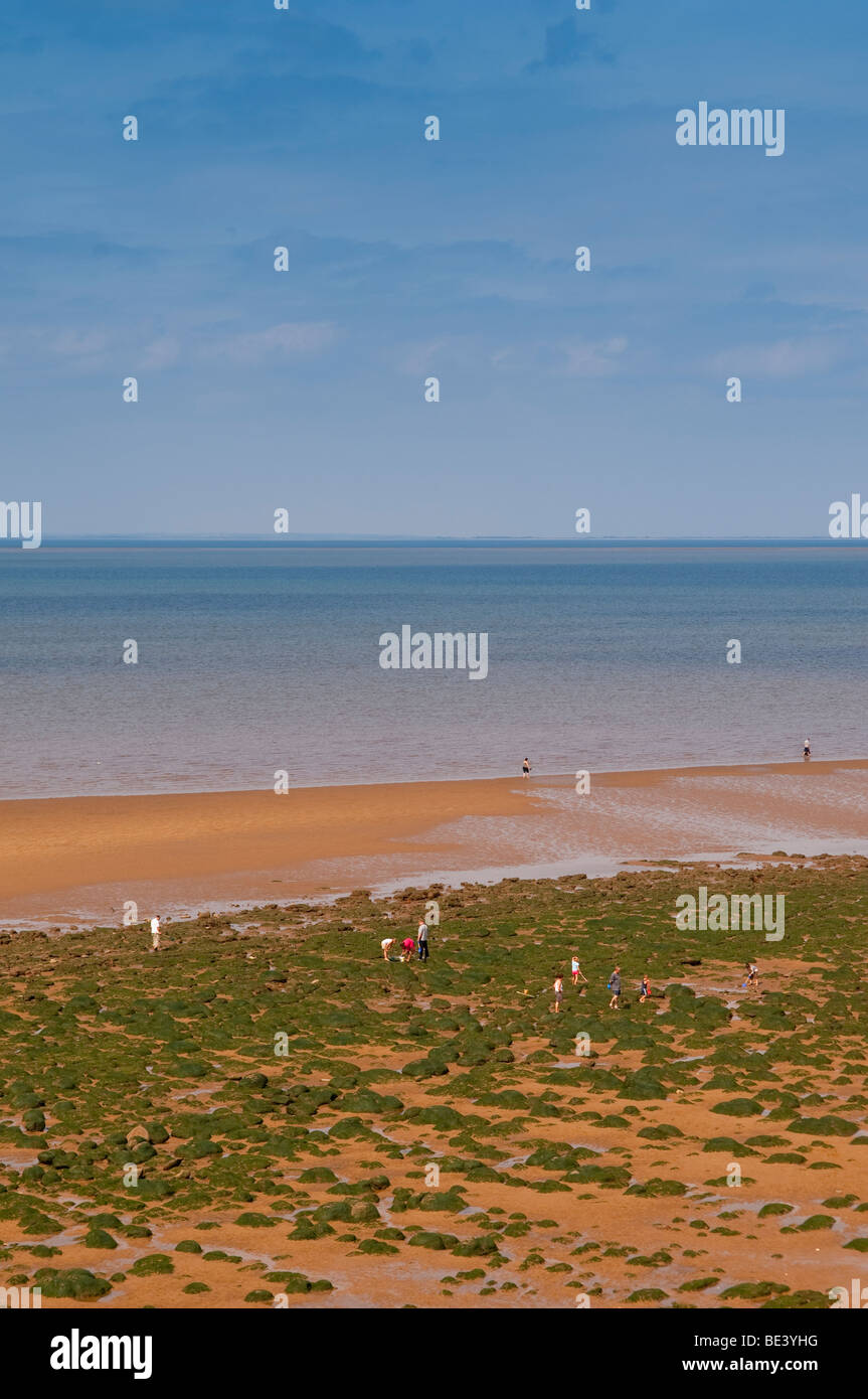 The beach with people at Hunstanton , North Norfolk , Uk Stock Photo