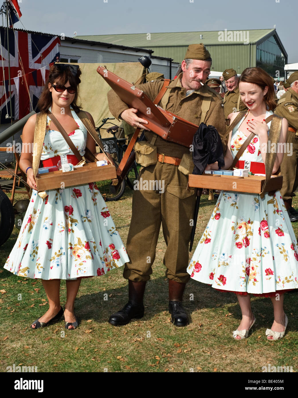 Look-alike of Private Joe Walker with cigarette girls at The Goodwood Revival 2009 Stock Photo