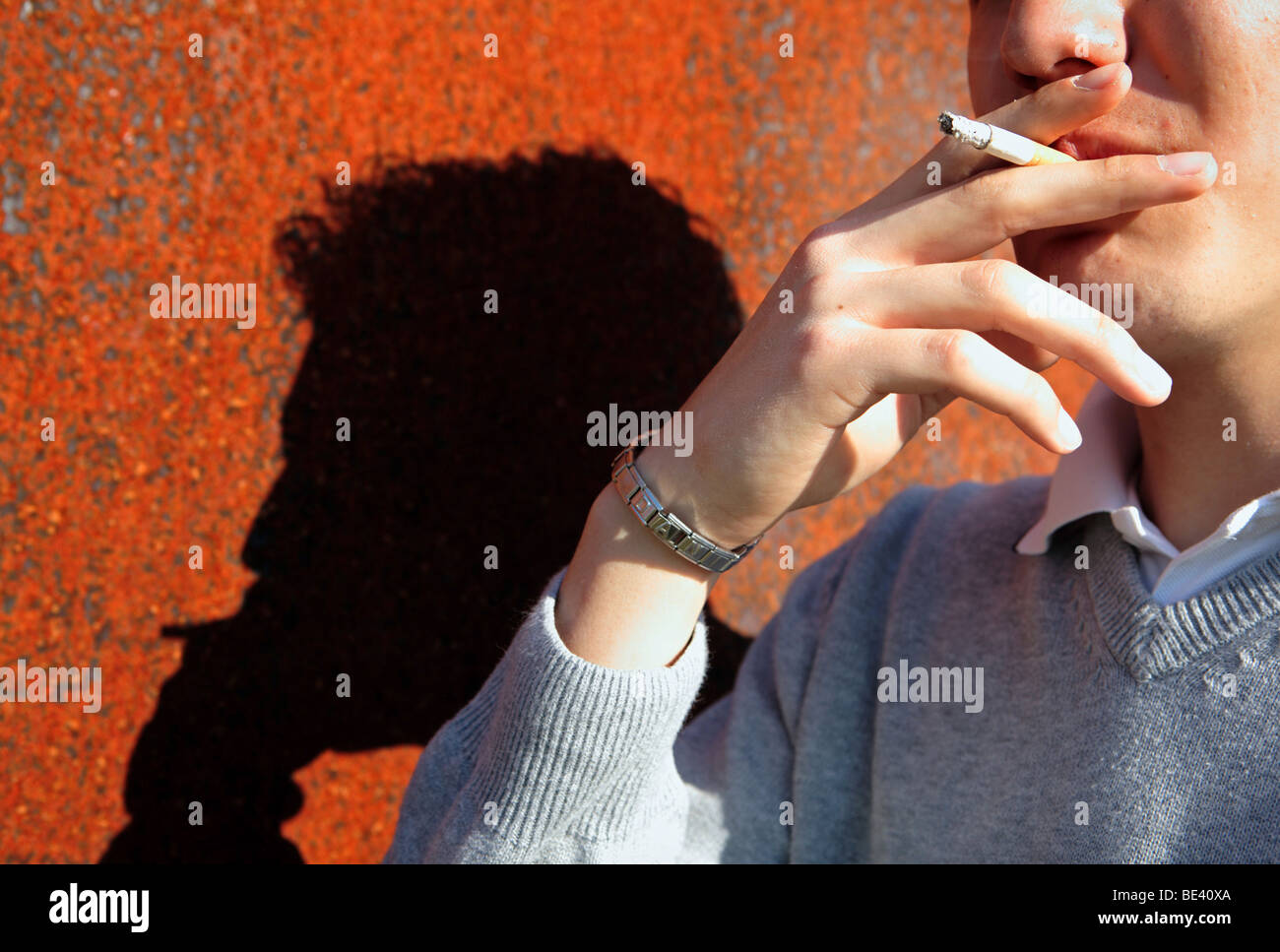 MAN WITH CIGARETTE. Stock Photo