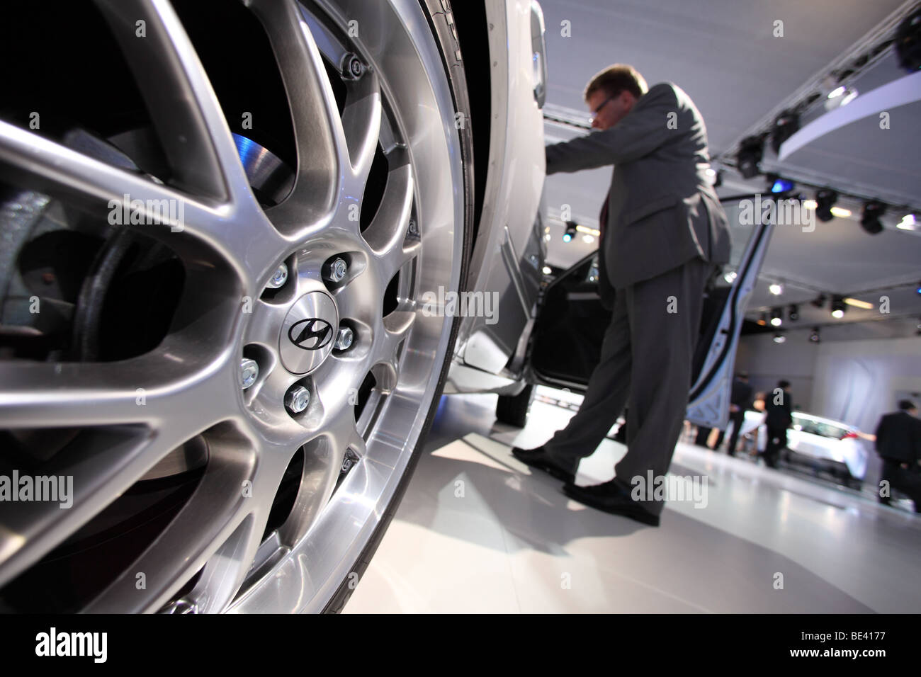 63th International Motor Show ( IAA ): A visitor is interested in a car of the manufacturer Hyundai Stock Photo