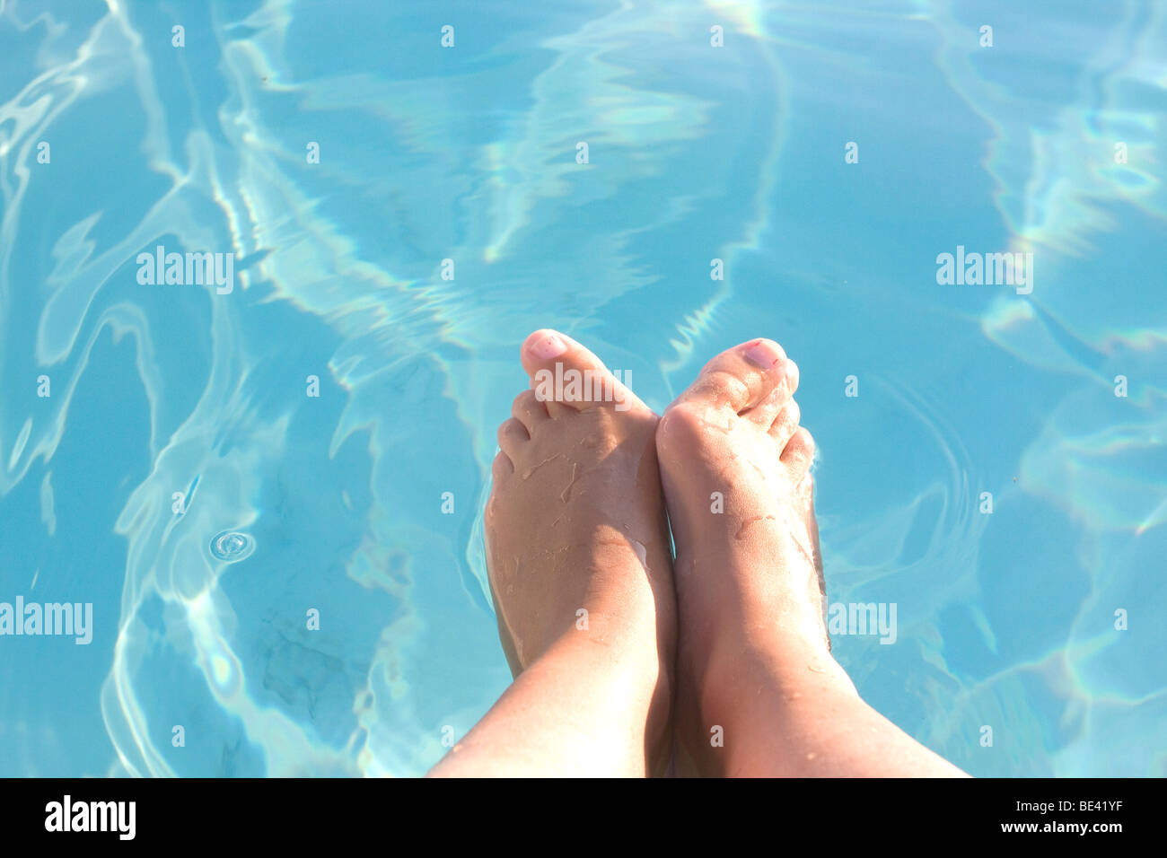 Feet Above Water Stock Photo