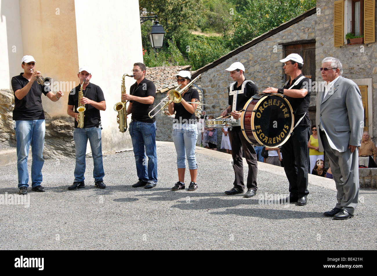 Band playing at the war memorial during the fete at Marie Village, Alpes Maritimes, France Stock Photo