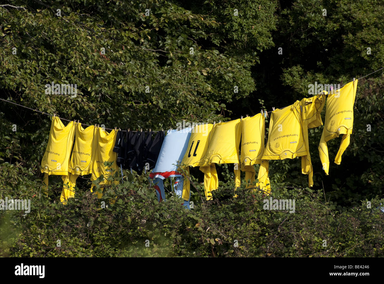 Football kit hanging on a washing line Stock Photo - Alamy