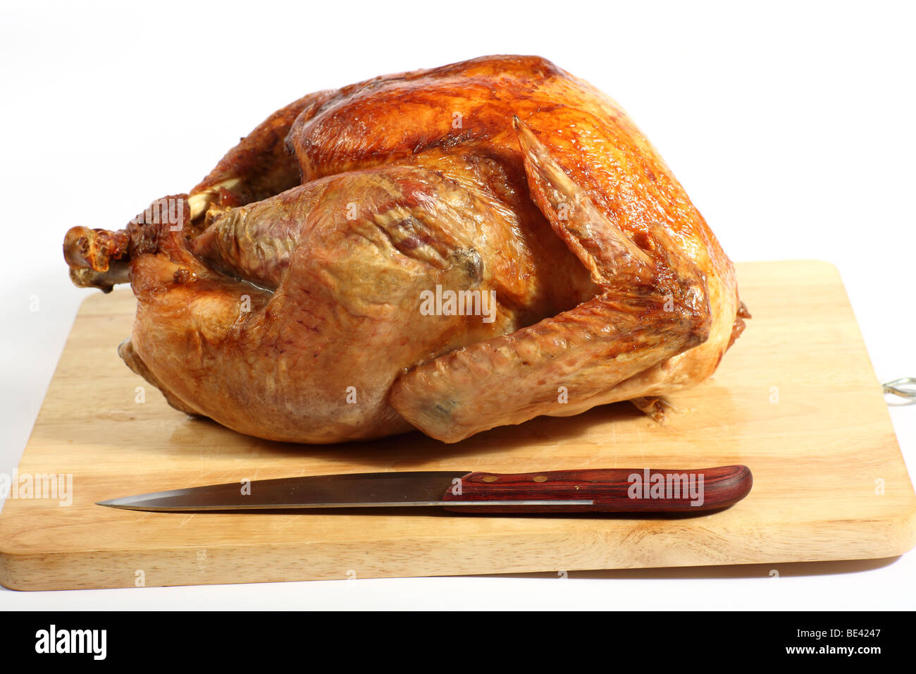 Side view of a roasted turkey on a chopping board Stock Photo Alamy