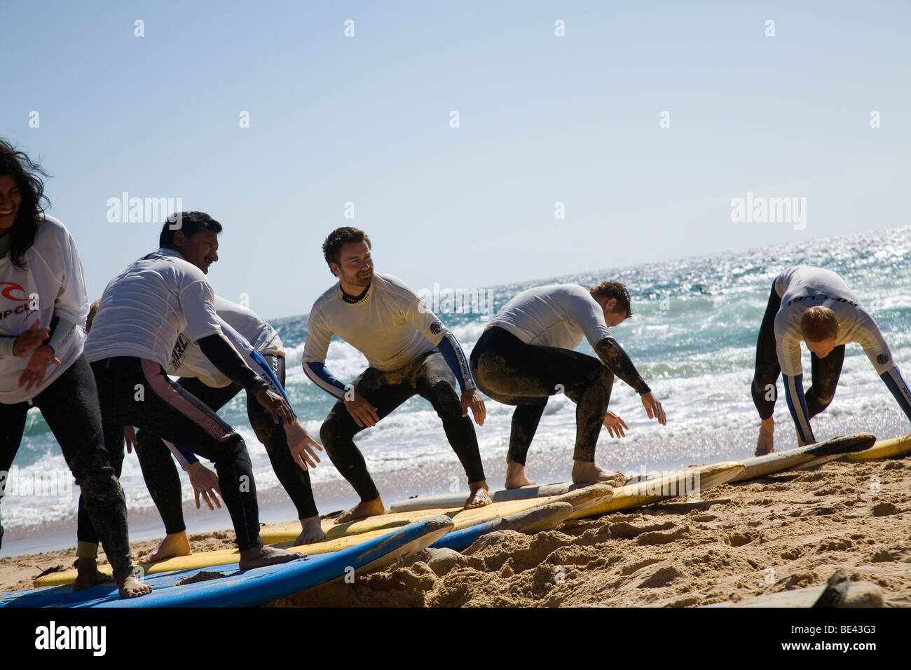 Learning to surf at Surfschool on the sands of Manly Beach. Sydney, New South Wales, AUSTRALIA Stock Photo