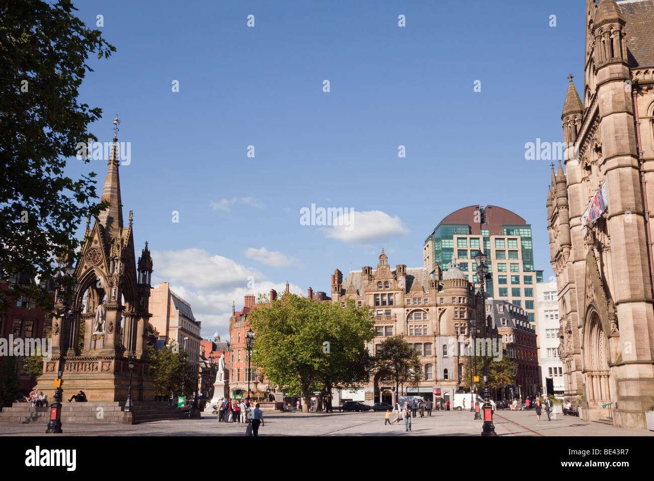 The town Hall Victorian neo-Gothic building and Albert monument in Albert Square, Manchester, England, UK, Britain. Stock Photo