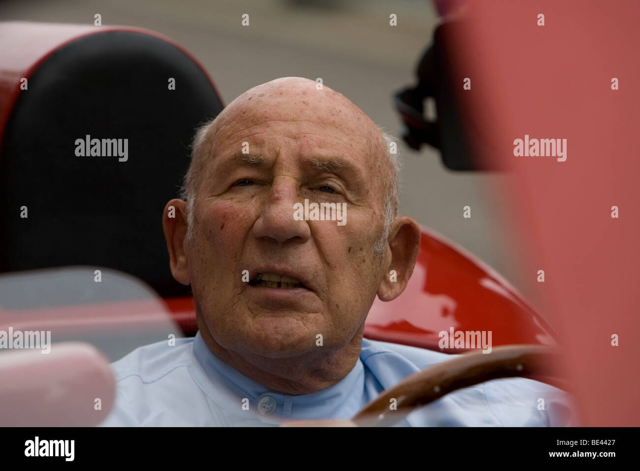 Close up portrait of Sir Stirling Moss in his OSCA FS372 at Goodwood Revival 2009. Sir Stirling celebrated his 80th birthday here on 17th September. Stock Photo