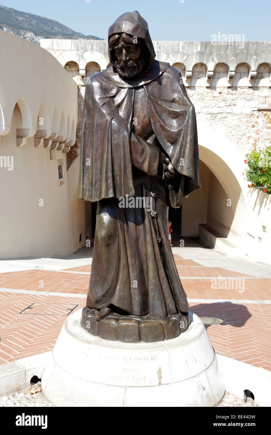 statue of François Grimaldi outside the palace commemorates his capture of the fortress disguised as a monk in 1297 Stock Photo