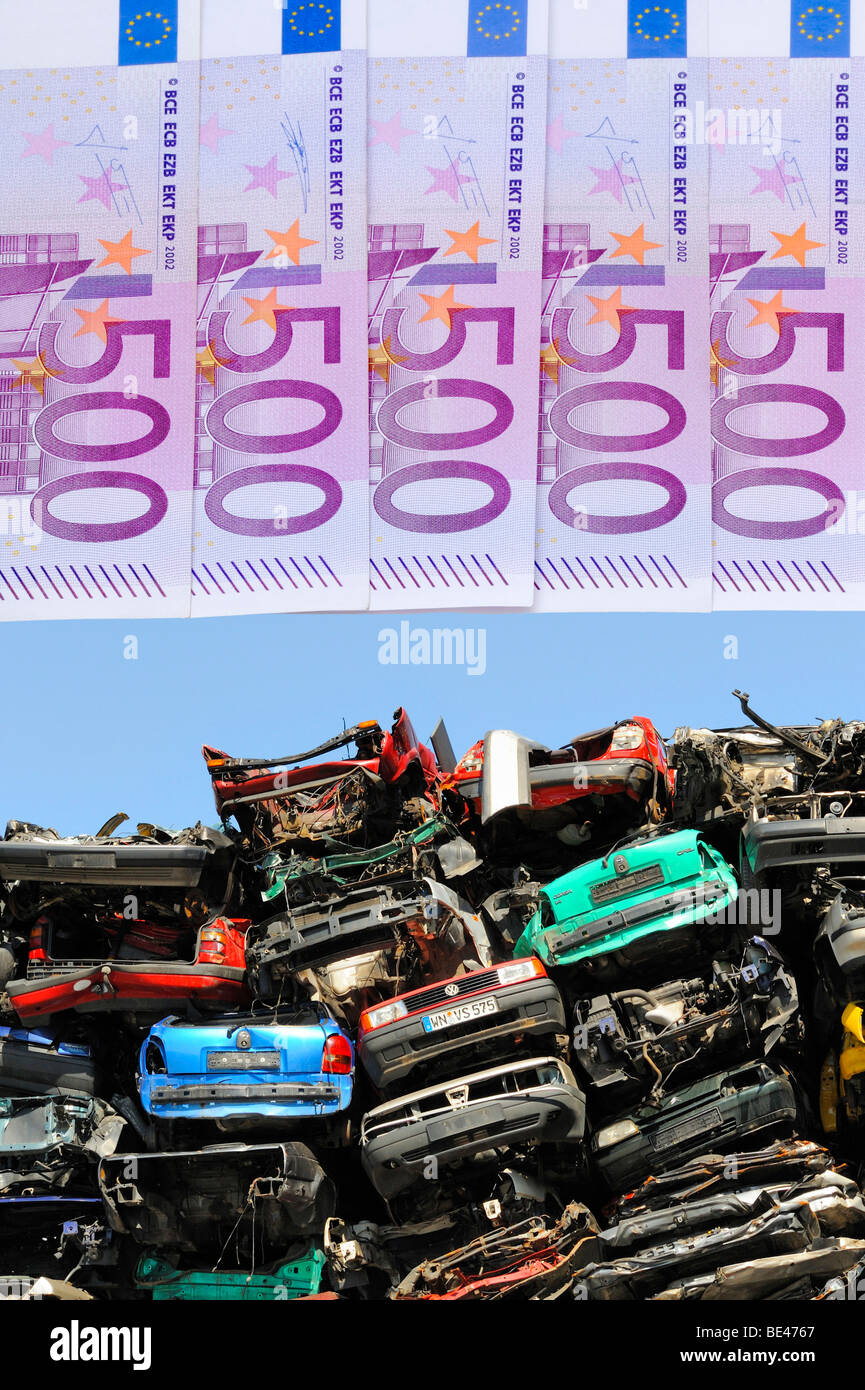 Old cars, banknotes, symbolic picture for scrapping premium Stock Photo
