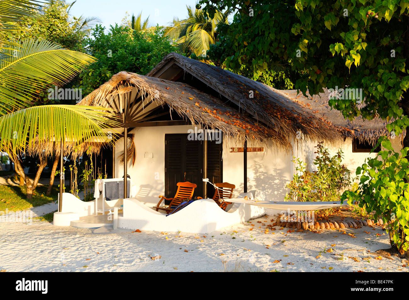 Sunny entrance of a bungalow, open door, palm trees, Maldive island, South Male Atoll, Maldives, Achipelago, Asia, Indian Ocean Stock Photo