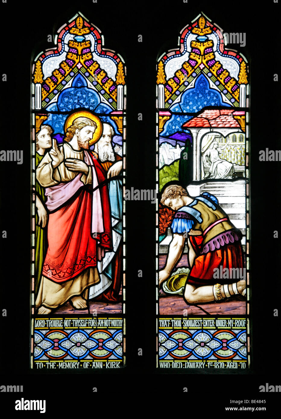 A Stained Glass Window Depicting The Centurion of Capernaum, beseaching Jesus to heal his sick servant Stock Photo